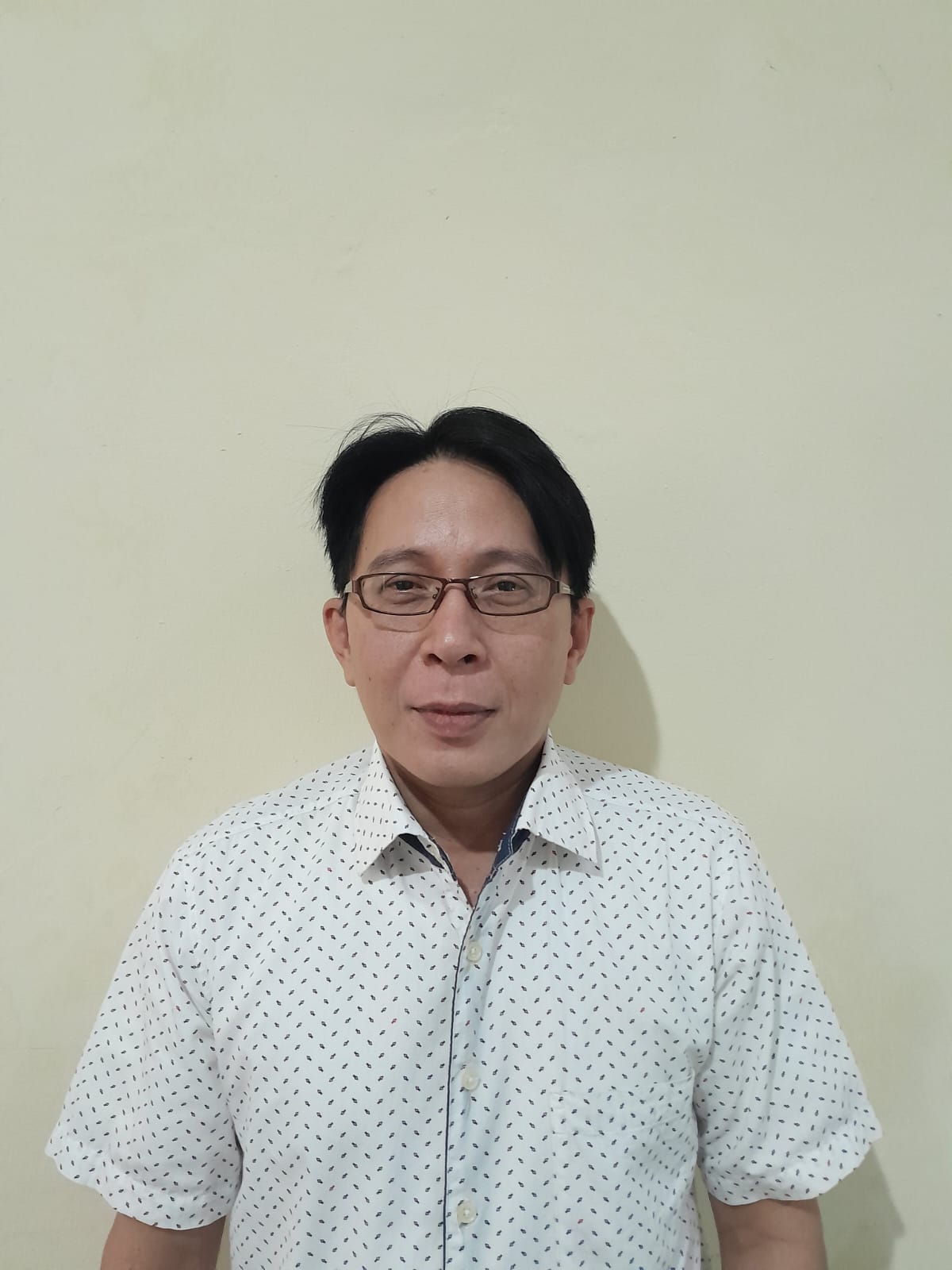 Tommy Ogie, SP., M.Si